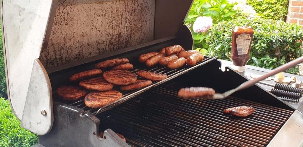 Burgers and hot dogs on the BBQ for Dorrington House Watton's 20th Birthday!