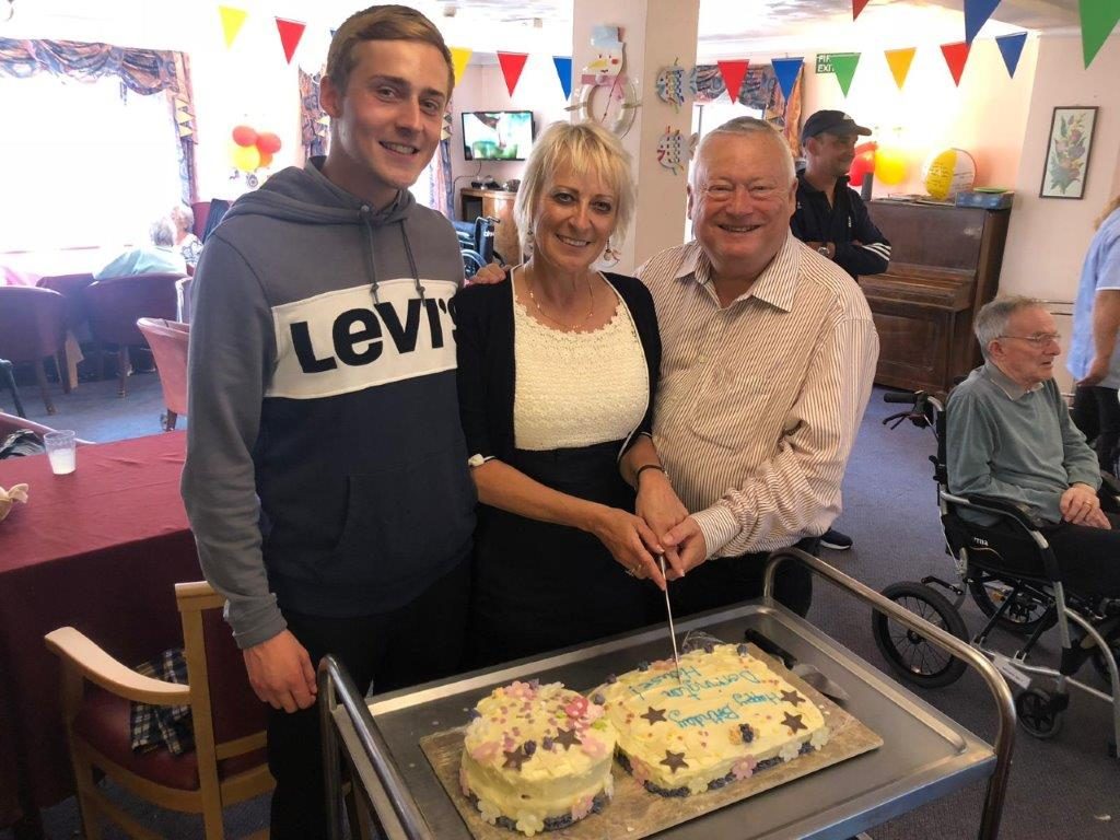 Cutting the birthday cake with; Shane Lorraine and Steve Dorrington, at Dorrington House Watton's 20th Birthday!